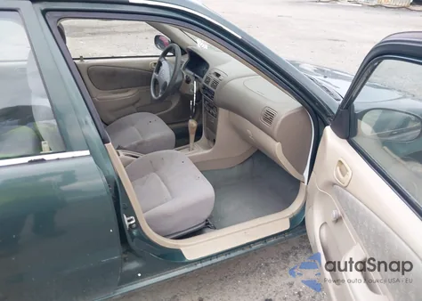 2000 Toyota Corolla Ve from USA, damaged, VIN 2T1BR12E7YC280546